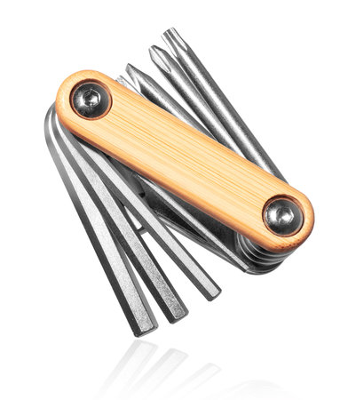Steel travel cycling repair kit close-up, isolated on a white background