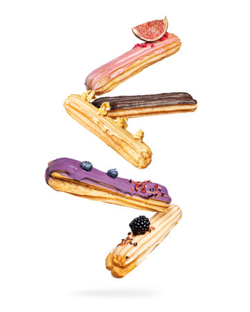 Delicious eclairs with different flavors in the air on a white background