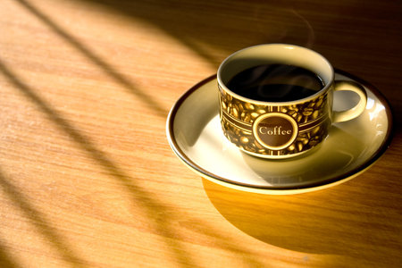Morning hot coffee cup on wood background