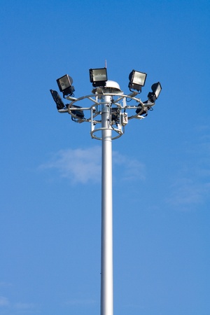 Tall electricity post or lamp with eight lightsの写真素材