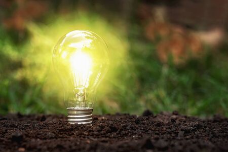 Lamp on the ground according to the concept or concept of energy savingの写真素材