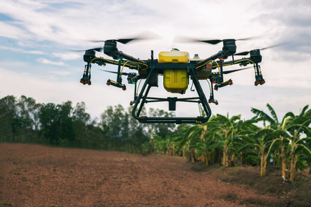 farmers are using Flying drone spraying medicine in agriculture