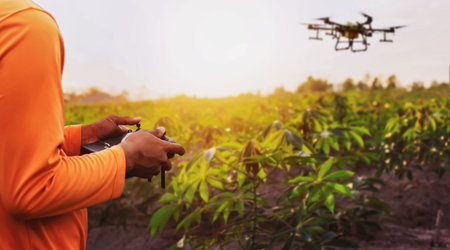 farmers are using Flying drone spraying medicine in agricultureの写真素材