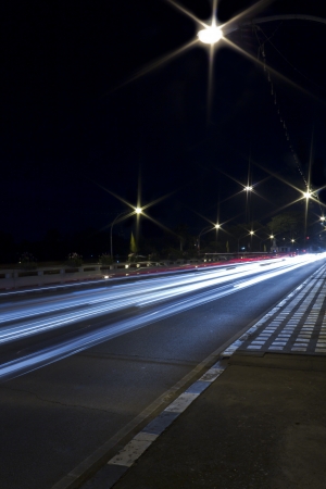 Speedy Car's Light Trails on the Road at Twilight Time.の写真素材