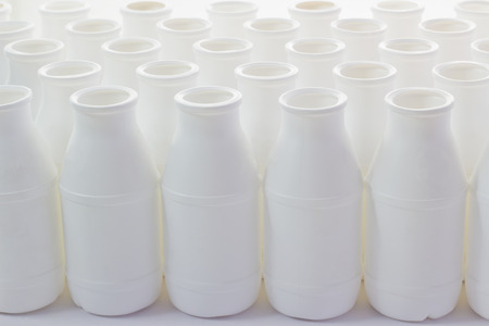 White Plastic Bottles, front view Backgroundの写真素材