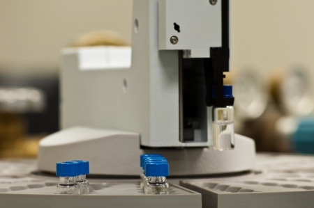 A Sample vial in robot handの写真素材