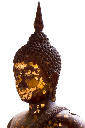 Buddha head and gold leaf on white backgroundの写真素材