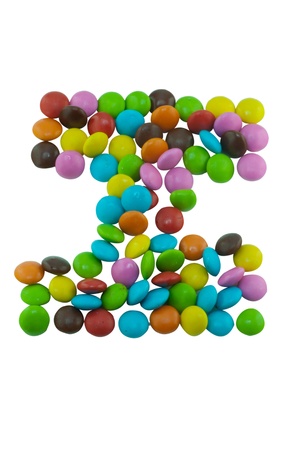 Colorful candies lay in letter I on white backgroundの写真素材