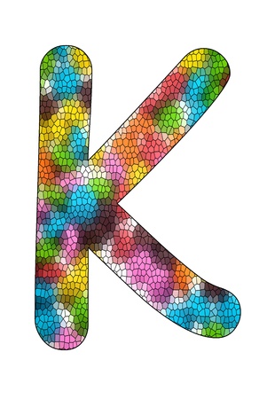 Colorful candies lay in letter K with strained glass effect in front of white backgroundの写真素材