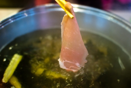 Pieces of paper-thin sliced pork for on Japanese Hotpotの写真素材