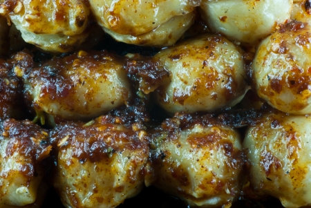 Stack of meatball with spicy sauceの写真素材