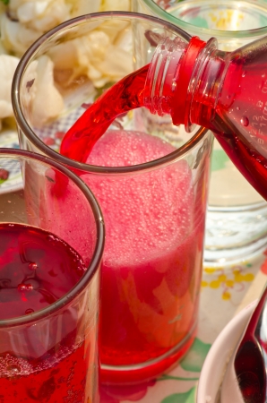 Chinese red beverage in merit ceremony for the deadの写真素材