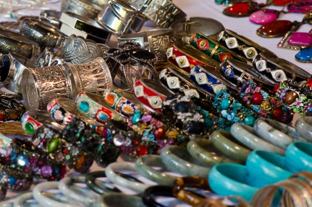 Rows of colorful hand-made bracelets - shallow DOF.の写真素材