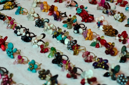 Rows of colorful hand-made rings- shallow DOF.の写真素材