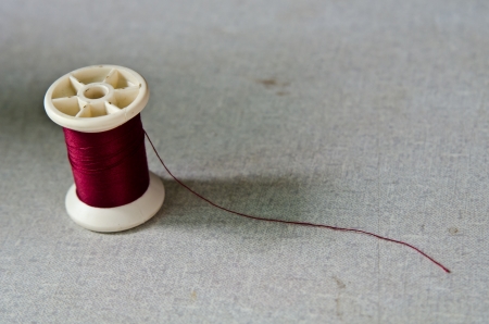 Thread red bobbinの写真素材
