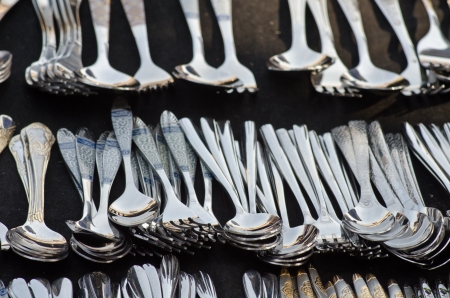 Closeup of shiny spoon and forkの写真素材