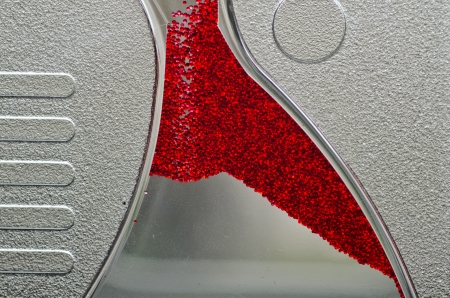 Red micro particle movingの写真素材