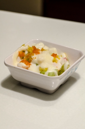 a salad in a white cupの写真素材