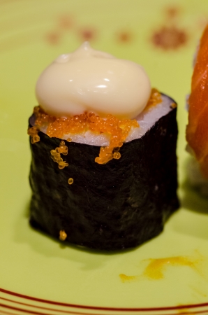 Philadelphia classic  Salmon, Philadelphia cheese, cucumber, avocado, tobiko  Japanese sushiの写真素材