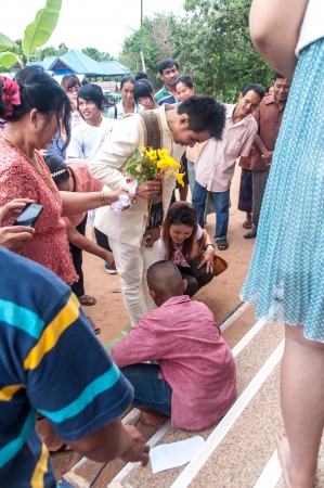Asian thai couple bride and bridegroom in thai wedding suit at wedding ceremonyのeditorial素材