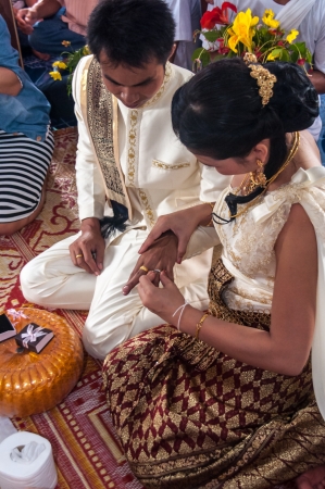 Asian thai couple bride and bridegroom in thai wedding suit at wedding ceremonyのeditorial素材