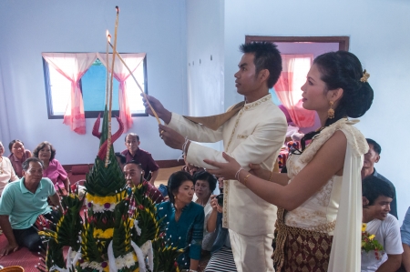 Asian thai couple bride and bridegroom in thai wedding suit at wedding ceremonyのeditorial素材