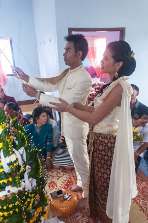 Asian thai couple bride and bridegroom in thai wedding suit at wedding ceremonyのeditorial素材