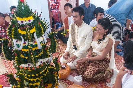 Asian thai couple bride and bridegroom in thai wedding suit at wedding ceremonyのeditorial素材