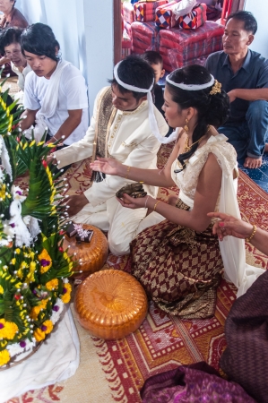 Asian thai couple bride and bridegroom in thai wedding suit at wedding ceremonyのeditorial素材