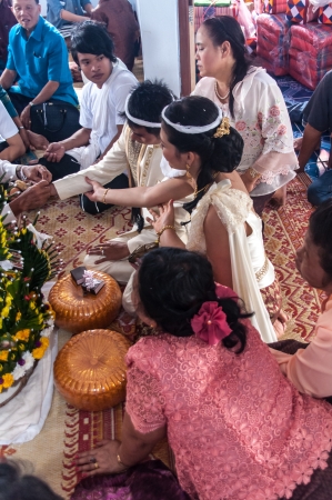 Asian thai couple bride and bridegroom in thai wedding suit at wedding ceremonyのeditorial素材