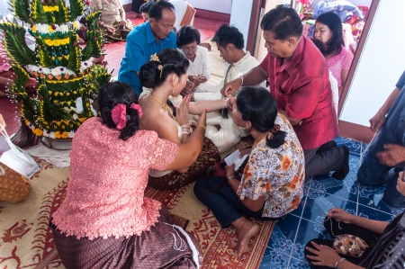 Asian thai couple bride and bridegroom in thai wedding suit at wedding ceremonyのeditorial素材