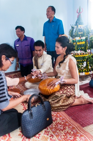 Asian thai couple bride and bridegroom in thai wedding suit at wedding ceremonyのeditorial素材