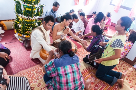 Asian thai couple bride and bridegroom in thai wedding suit at wedding ceremonyのeditorial素材