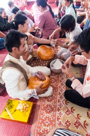 Asian thai couple bride and bridegroom in thai wedding suit at wedding ceremonyのeditorial素材