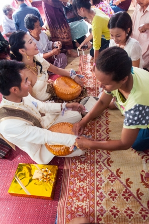 Asian thai couple bride and bridegroom in thai wedding suit at wedding ceremonyのeditorial素材
