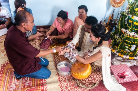 Asian thai couple bride and bridegroom in thai wedding suit at wedding ceremonyのeditorial素材