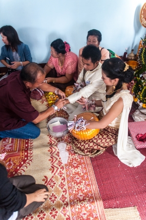 Asian thai couple bride and bridegroom in thai wedding suit at wedding ceremonyのeditorial素材