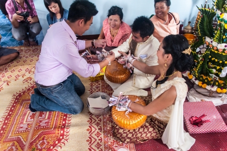 Asian thai couple bride and bridegroom in thai wedding suit at wedding ceremonyのeditorial素材