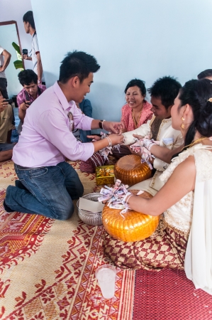 Asian thai couple bride and bridegroom in thai wedding suit at wedding ceremonyのeditorial素材