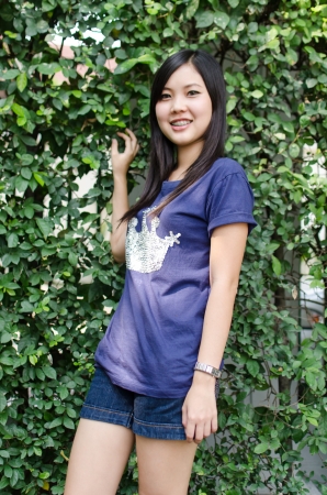 Asian girl, in a gardenの写真素材