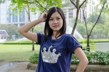 Lovely Chinese girl in the gradenの写真素材