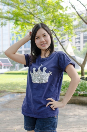 Lovely Chinese girl in the gradenの写真素材