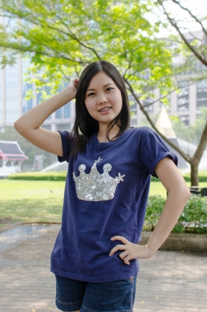 Lovely Chinese girl in the gradenの写真素材