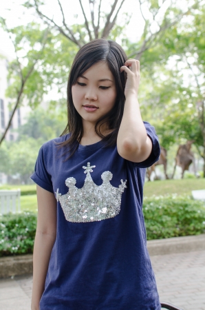 Lovely Chinese girl in the gradenの写真素材