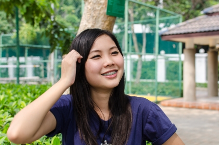 Lovely Chinese girl in the gradenの写真素材