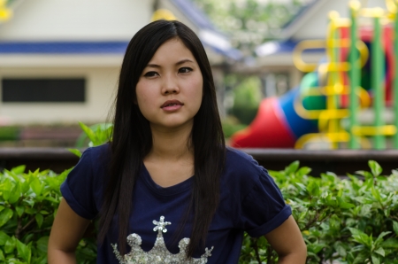 Lovely Chinese girl in the gradenの写真素材