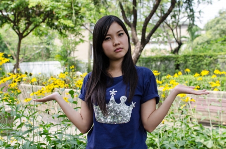 Lovely Chinese girl in the gradenの写真素材