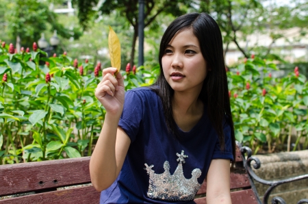 Lovely Chinese girl in the gradenの写真素材