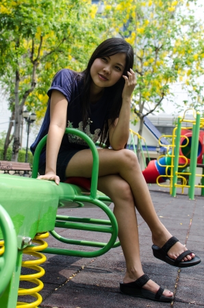Lovely Chinese girl in the gradenの写真素材
