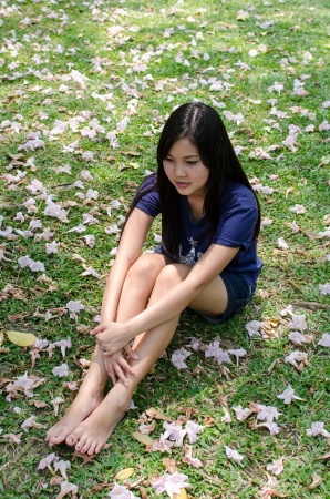Lovely Chinese girl in the gradenの写真素材